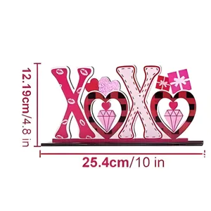 Valentine wooden XOXO tabletop decoration sign with heart and gift details for party.