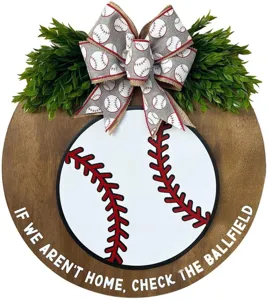 Wooden baseball door sign with green leaves and bow, perfect for front door home decor.