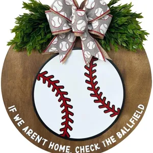 Wooden baseball door sign front porch hanging decor with ribbon bow and greenery plants
