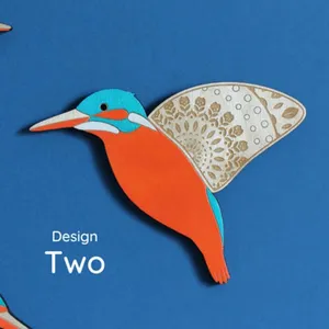 Detailed view of wooden kingfisher bird wall hanging craft with intricate wing design and vibrant colors.