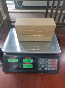 Gedetailleerd overzicht van de kartonnen verpakking voor de grappige zwembadthermometer.