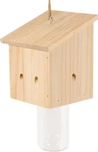 Wooden carpenter bee trap with glass jar insect catcher hanging for outdoor garden use