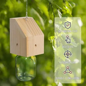 Wooden carpenter bee trap with glass jar and hanging chain for outdoor garden pest control.
