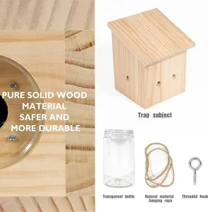 Wooden carpenter bee trap detail showing solid wood structure, bottle, rope and hook for garden.
