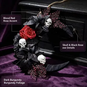 Close-up detail of Halloween gothic crescent wreath featuring skull and dark rose accents.