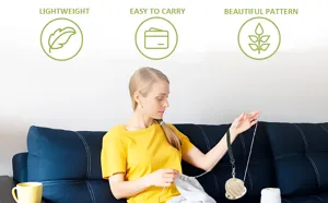 Portable wooden wrist yarn holder in use on couch, lightweight craft tool for knitting lovers.