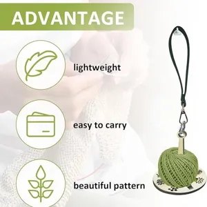 Portable wrist yarn holder with wooden base and green yarn ball for convenient knitting work.