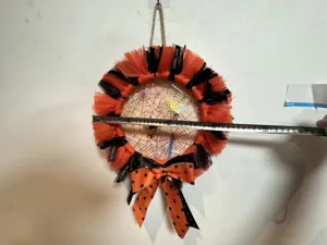 Ghirlanda Halloween arancione e nera rete ragnatela decorazione porta parete festa