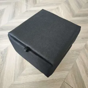 Black fabric pet stool detail part, durable textured cloth cover, convenient for pets.
