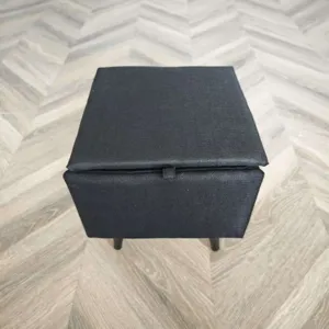 Black fabric pet step stool detail view, versatile two-in-one pet ladder and storage box.