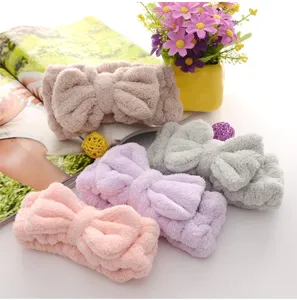 Soft coral fleece bow headband for makeup washing face, cute wide hair band for women.