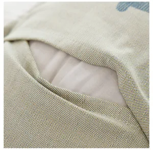 Close-up detail of the breathable cotton gauze pillowcase opening showing fine weave texture.