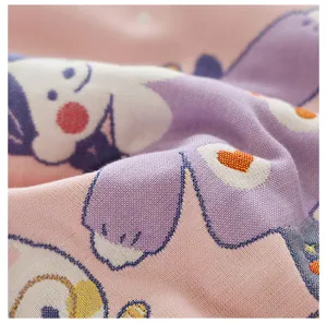 Close-up of cute cartoon bear cotton gauze pillowcase detail, soft texture fabric.