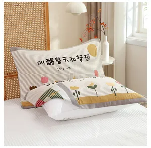 Detailed view of soft cotton gauze pillowcase featuring cozy floral prints for bedroom.