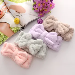 Soft coral fleece bow headband for makeup and face wash, cute wide hair hoop accessories.