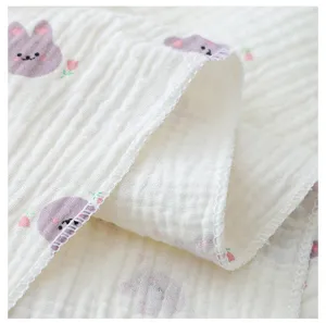 Couverture bébé lange en double gaze douce gros plan texture serviette bain nouveau né mignonne