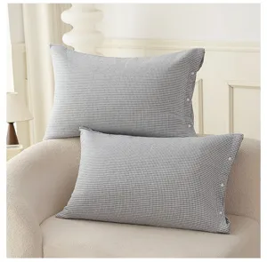 Classic black and white checkered cotton pillowcase with snap buttons, cozy home decor bedding style.