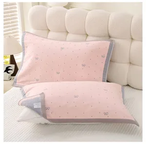 Soft cotton pillowcase with cute bows and dots pattern, comfortable home bedroom detail view.