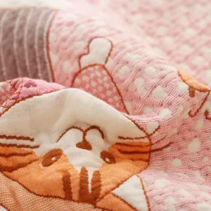 Soft cotton gauze pillow towel detail, cute cartoon cat pattern, breathable home bedding.