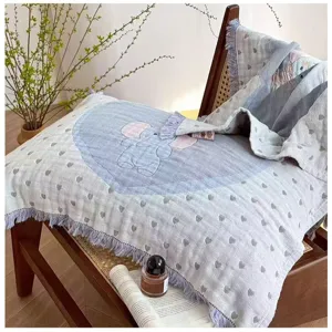 Soft four layer gauze pillow cover with fringe and cute elephant embroidery for home use.