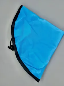 Blue waterproof toy storage bag portable beach mat with durable black drawstring and sturdy edging.