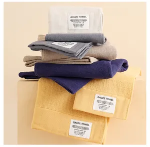 Toalla facial de gasa de algodón puro suave en varios colores sólidos para uso diario en casa.