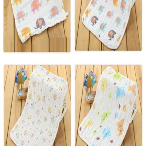 Serviette de visage bébé en gaze de coton douce avec jolis imprimés d'animaux pour usage quotidien.