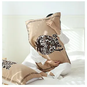 Cotton gauze pillowcase with cute leopard strawberry print, soft breathable bedding detail.