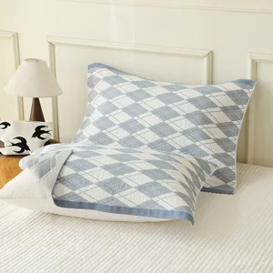 Soft cotton gauze pillow covers with blue diamond pattern, breathable home pillow shams pair.