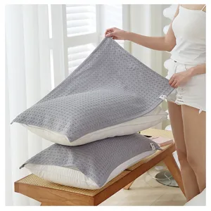 Solid color waffle knit pillow towel for home and dorm, breathable and sweat absorbent.