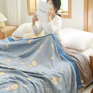 Soft 5-layer gauze cotton air conditioning blanket with cute cartoon lion and star pattern for summer.