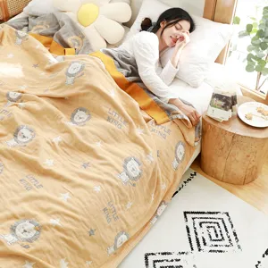 Cozy 5-layer cotton gauze air conditioning blanket with cute lion pattern for summer bedroom use.