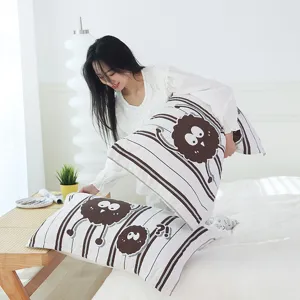 Cotton gauze couple pillowcases with cute cartoon embroidery and stripes, soft and breathable.
