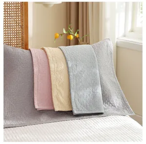 Pure cotton four-layer gauze pillow towel detail showing soft texture and solid color design.