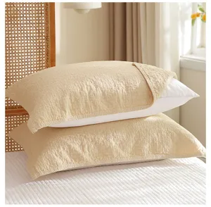 Pure cotton four-layer gauze pillow towel close-up, soft textured solid color bedding decor.