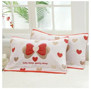 Cotton gauze children pillowcase detail view with cute bow and heart pattern design.