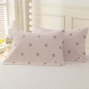 Pink striped pillow covers with cute flower embroidery, soft cotton gauze pillowcases for home.