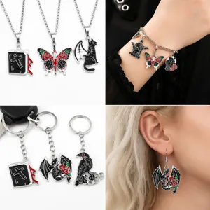 Gothic Halloween enamel pendants featuring dragon, butterfly and crow charms