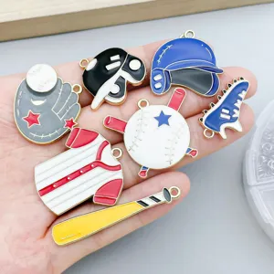 Detailed close-up of various colorful baseball themed enamel alloy pendants held in a hand