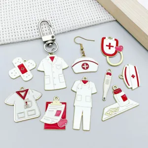 Detailed view of red and white medical-themed alloy charms for DIY jewelry making