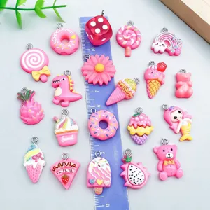 Macro view of 20 pink resin charms including donuts and ice cream for DIY jewelry crafts