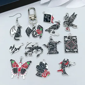 Collection of 12 dark Gothic Halloween alloy pendants featuring dragon and bat designs