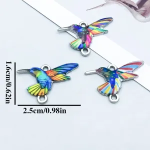 Detailed view of colorful enamel hummingbird charms with precise size markings 2.5x1.6cm