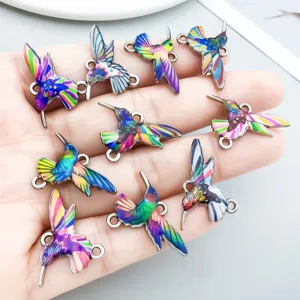 Detailed view of colorful hummingbird alloy charms with double loops for DIY jewelry