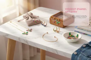 Close-up of vibrant enamel hummingbird pendants and charms for bespoke DIY jewelry.