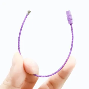 Close-up of a purple painted steel wire keychain loop with a screw connector