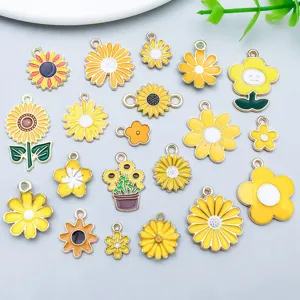 Detailed view of 20 assorted yellow enamel sunflower and daisy charms for DIY jewelry