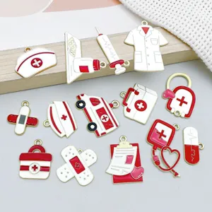 Mixed medical theme enamel charms featuring ambulance, stethoscope, and first aid kit icons