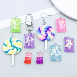 Macro view of colorful resin candy and gummy bear charms for DIY jewelry