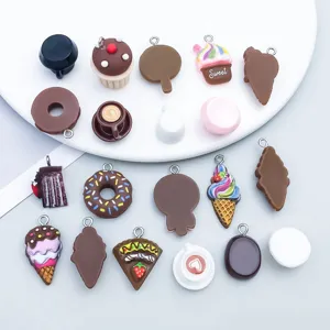 Close-up view of 20 assorted coffee-themed resin dessert charms for DIY jewelry